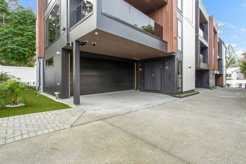 The house is the first unit in the row.