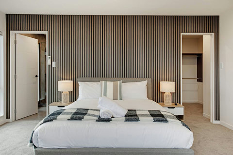 The main bedroom is spacious with a Queen bed and you can open the ranch sliders to enjoy the breeze.