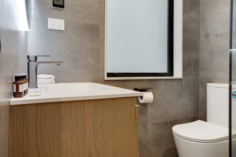 There is plenty of room on the vanity for all your personal belongings.