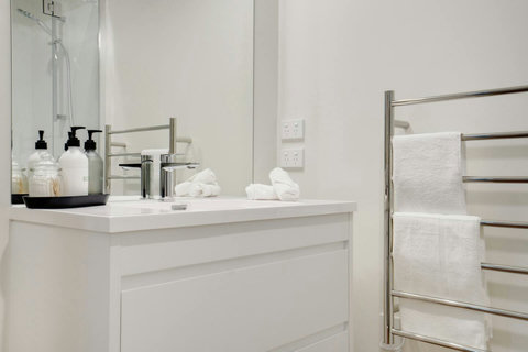 There is plenty of storage in the drawers or on top of the vanity unit.