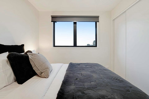 The cosy throw adds some colour to the neutral colour scheme.