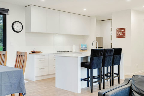 There is breakfast bar seating for those casual meals or for children to do homework.