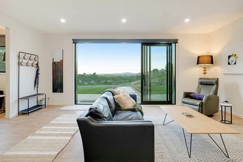 The main living room is part of the open-plan space including the kitchen and dining space.