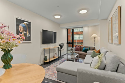 Relax on the couch and watch TV on the 55" screen.