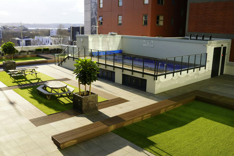 View from the apartment looking over the courtyard and pool below.