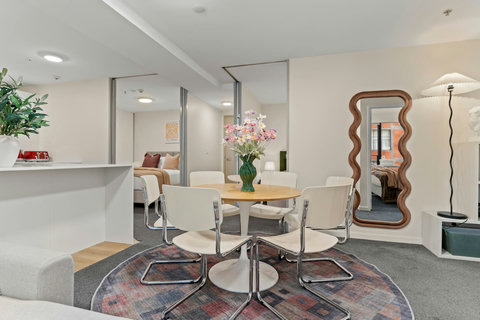 There are lots of extras in the apartment with soft furnishings and lamps creating a warm environment.