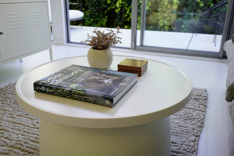 There is a handy coffee table for your drinks and popcorn.