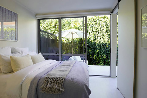 There is lots of natural light that streams into the bedroom through the ranch slider.