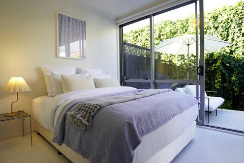 The ranch slider opens in the bedroom too.