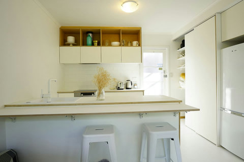 There is breakfast bar seating for those casual meals or for children to do homework.