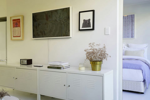 There is a Smart Samsung TV in the living room which can be setup as a piece of artwork.