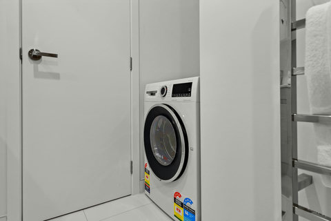 There is a handy combo washer and dryer in the apartment.