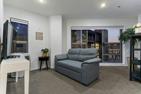 Relax on the couch and watch TV or read a book.