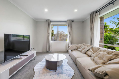 The second lounge has the TV and comfy couch.