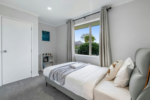 Check out the cool dinosaur figures in this bedroom.