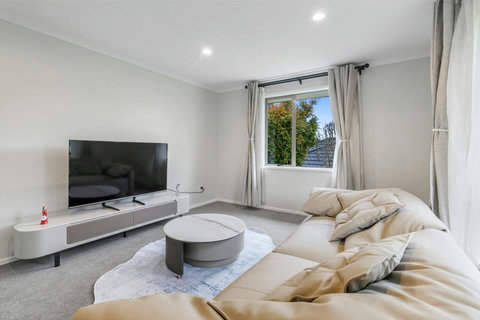 Have a movie night by drawing the drapes and making the room dark.