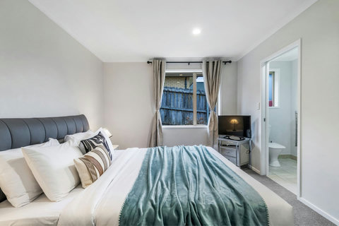 The main bedroom has an ensuite bathroom and double wardrobe.