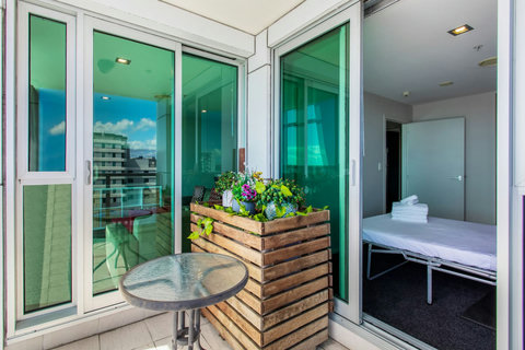 You can access the patio via one of the bedrooms or the lounge area.