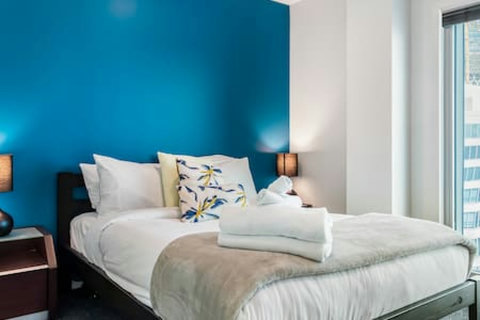 Have a great nights sleep in the double bed, with the pop of blue against the white crisp sheets.
