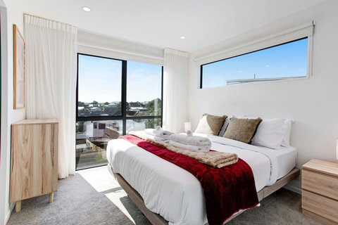 The lovely wooden furniture adds warmth to the room.