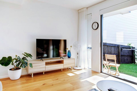 Sit on the couch and watch TV or read a book.