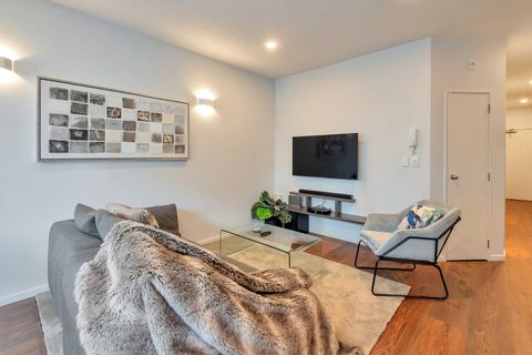 There is plenty of seating in the living space with a chaise style sofa and easy chair.