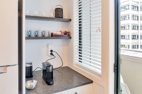 The kitchen comes with its own coffee nook including a Nespresso machine and milk frother.