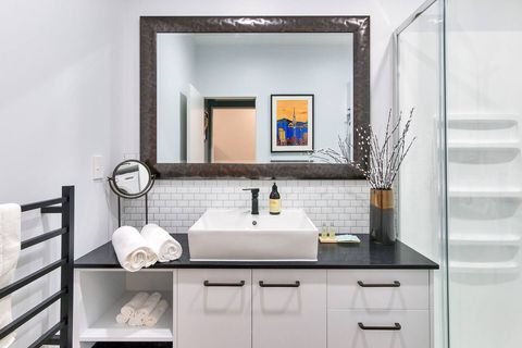 There is plenty of space on the vanity for all your personal belongings.