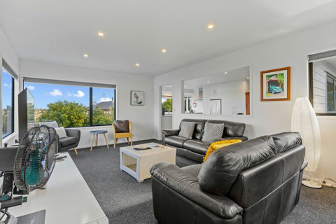 The main living room is part of the open-plan space including the kitchen and dining space.