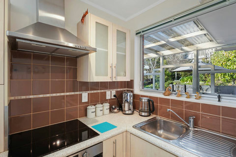 Enjoy doing the dishes while looking outside and enjoying the garden area.