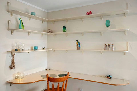 The desk space is great for work or study.