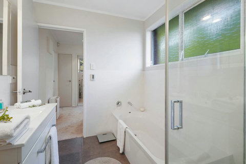 There is two entrances into the bathroom, from the hallway and bedroom.