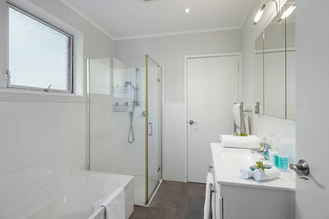 The bathroom has both a shower and bath, so you can choose what your prefer.