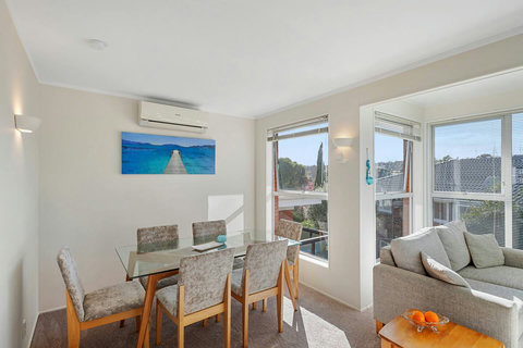 This living space has a heat pump which can heat in the cooler months and cool in the warmer months.