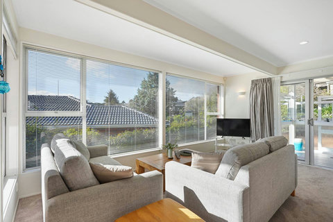 Open the ranch slider into the conservatory and out to the deck to enjoy the indoor/outdoor flow.