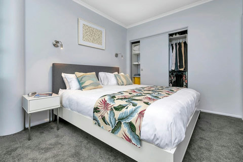 Kingsize bed with bedside tables and reading lights. Large builtin wardrobe with plenty of space for your clothes and luggage.