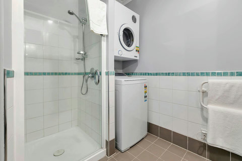Fully equipped in house laundry with washing machine and dryer. Large builtin shower with great pressure. Heated towel rail and fluffy towels.