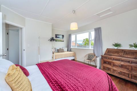The bedroom is light and airy with that relaxed holiday vibe you would expect in a traditional NZ Bach.