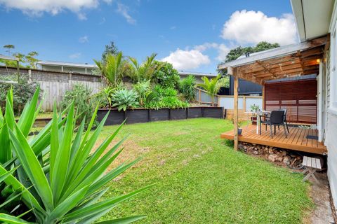 The backyard and garden area is landscaped and private.