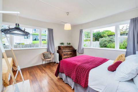 There is plenty of natural light that streams into the bedroom with drapes to block it out at night.