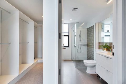 The ensuite bathroom has plenty of room to get ready.