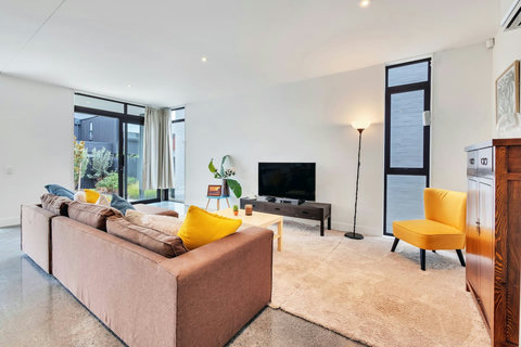 Relax on the lounge suite and watch TV or read a book.