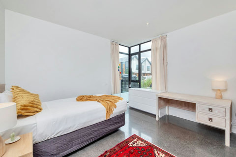 The single downstairs bedroom is a great space for kids or people just wanting their own space.