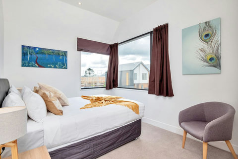 The second upstairs bedroom has a view of the garden.