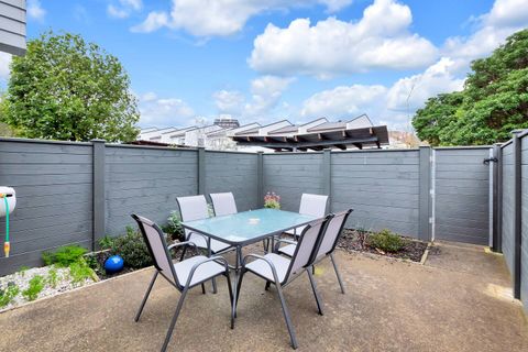 The patio is private and fully fenced with access through the gate.