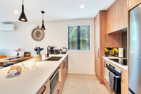 The kitchen has everything you need to cook up a storm with a fridge/freezer, oven, cooktop, microwave, and dishwasher.