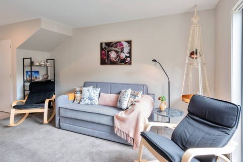 Enjoy the breeze from the open ranch slider in the cosy lounge.