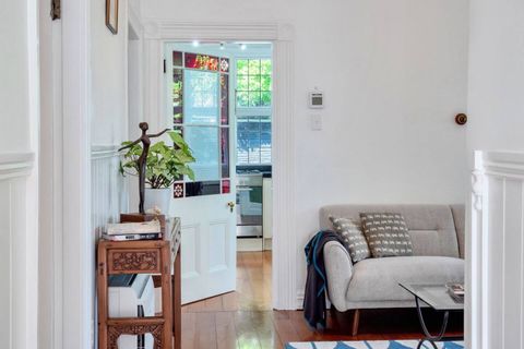 The design detail of the stained glass window is one of the original features of the house.