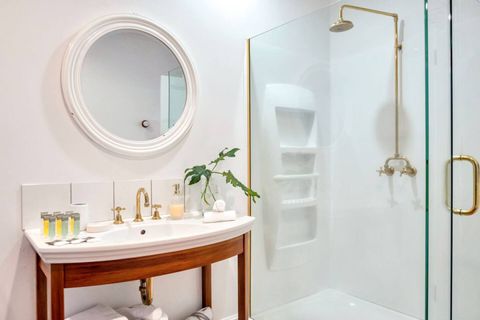 The vanity unit is a combination of old and new.