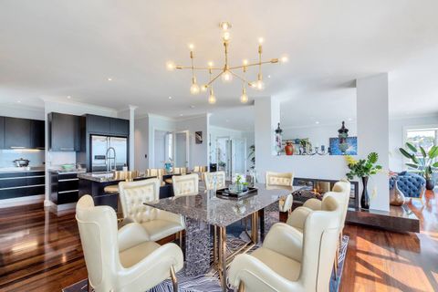 The formal dining room is a great spot to eat together whilst enjoying the fireplace. You can retire to the living room after dinner.